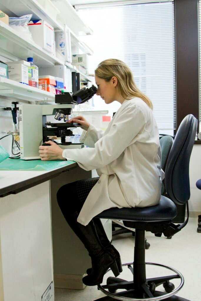 Scientist pipetting samples in a laboratory
